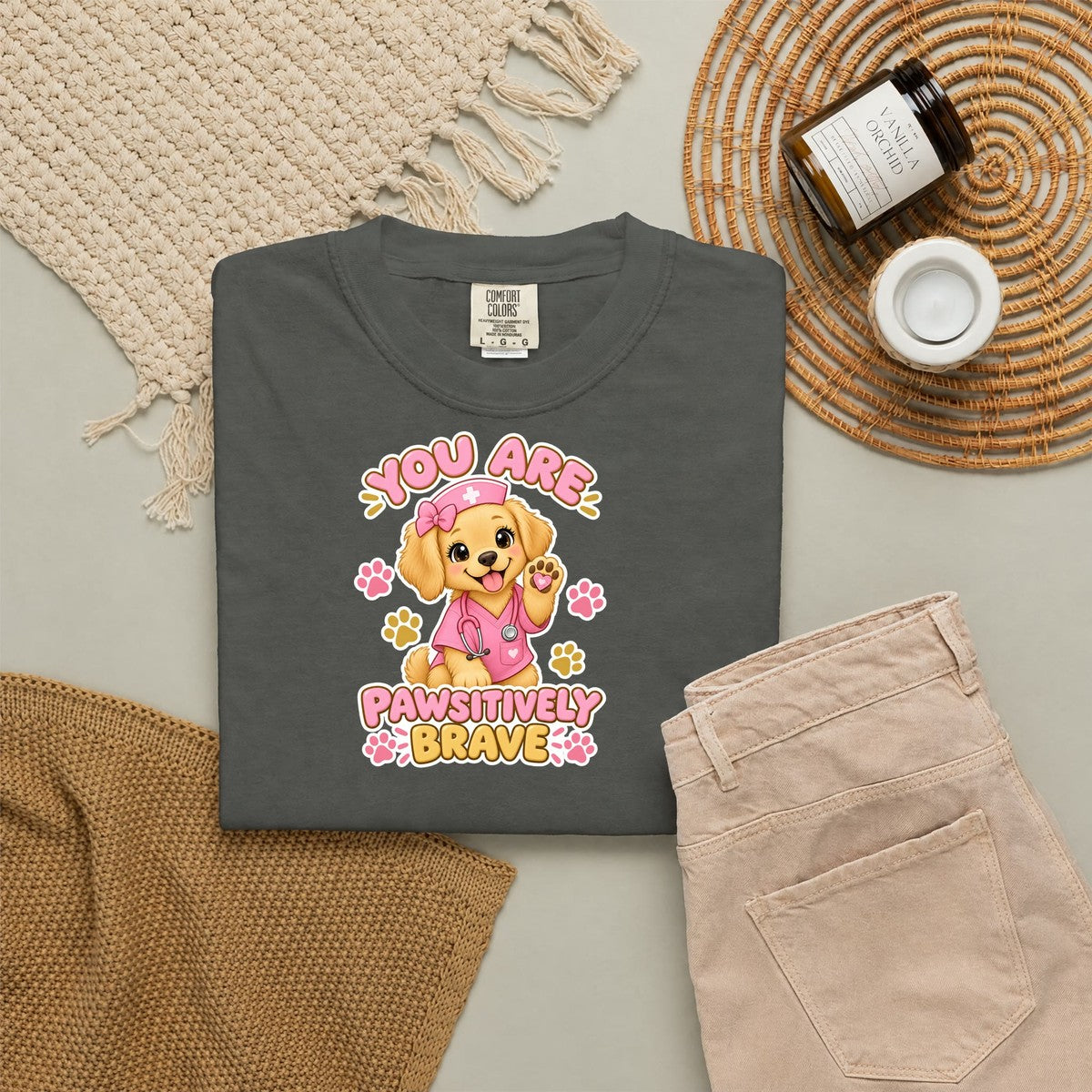 You Are Pawsitively Brave Puppy Peds Nurse Pink Comfort Colors T-Shirt folded