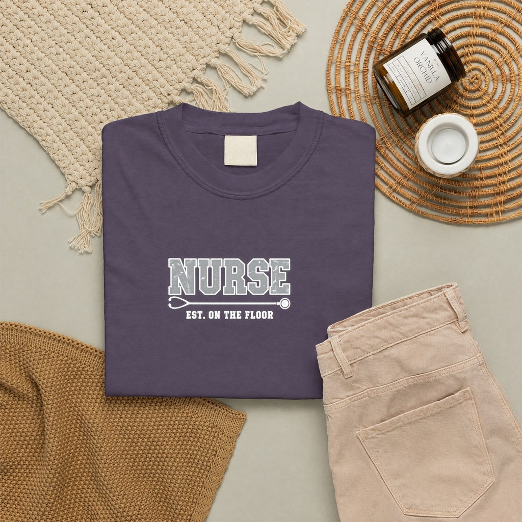 Nurse Varsity Est On the Floor Comfort Colors T-Shirt folded