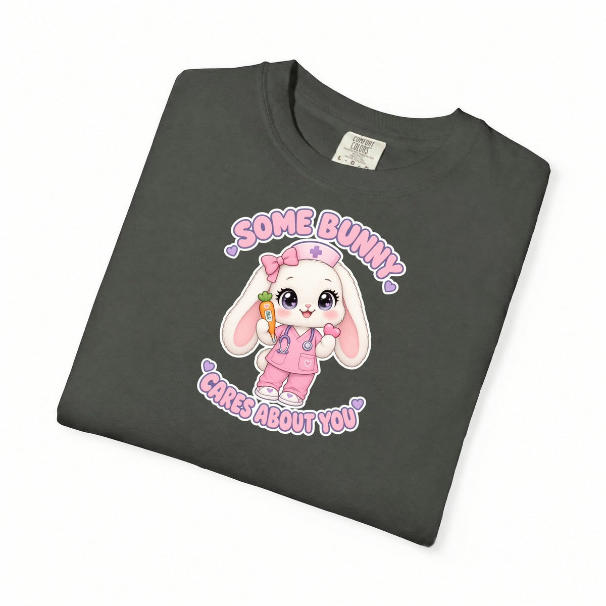 Some Bunny Cares About You Bunny Peds Nurse Pink Comfort Colors T-Shirt folded