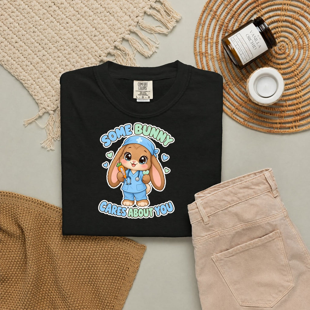 Some Bunny Cares About You Bunny Peds Nurse Blue Comfort Colors T-Shirt folded