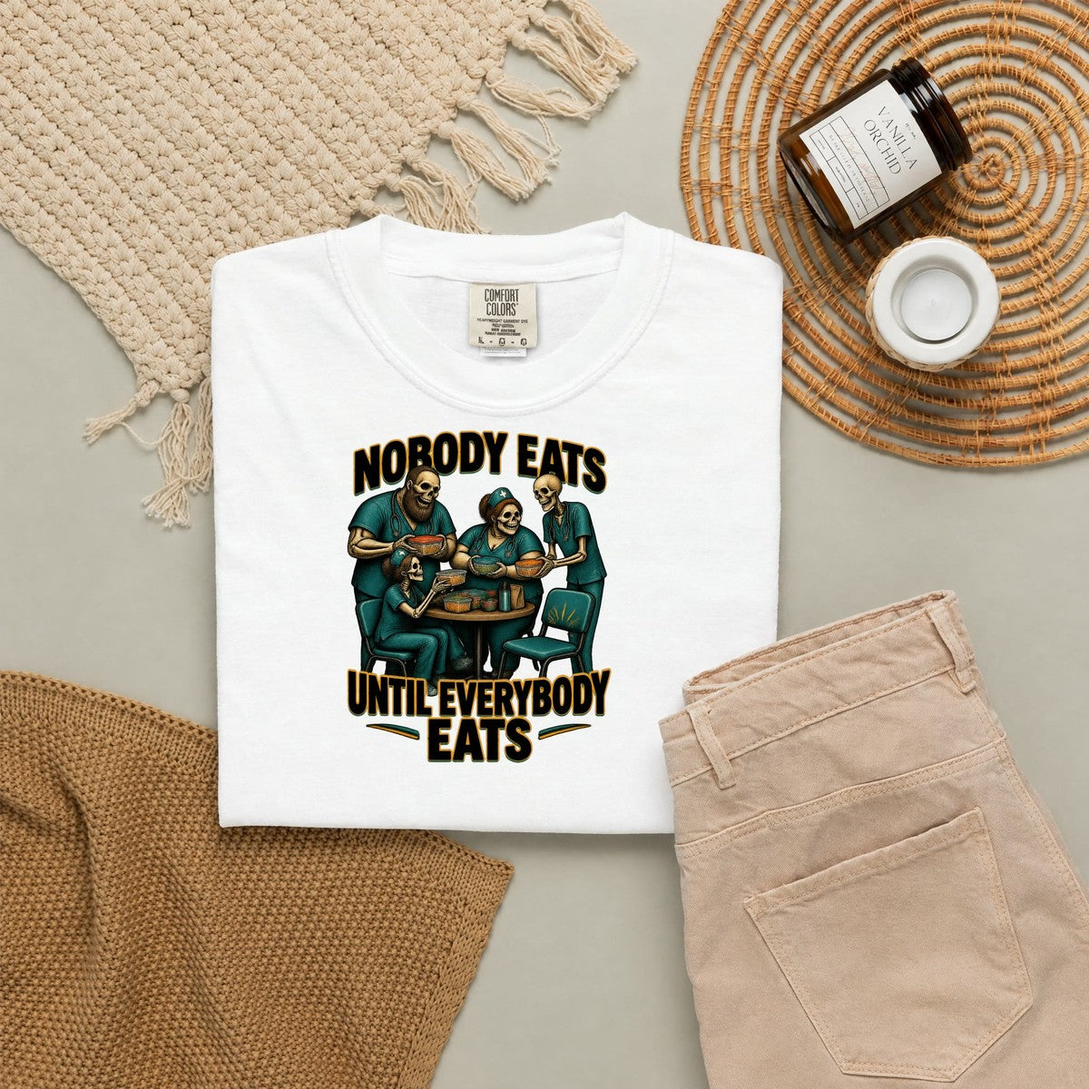 Nobody Eats Until Everybody Eats Skeleton Nurse Comfort Colors T-Shirt folded