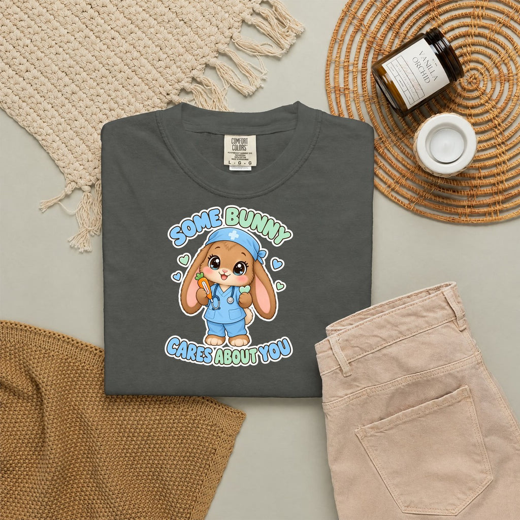 Some Bunny Cares About You Bunny Peds Nurse Blue Comfort Colors T-Shirt folded