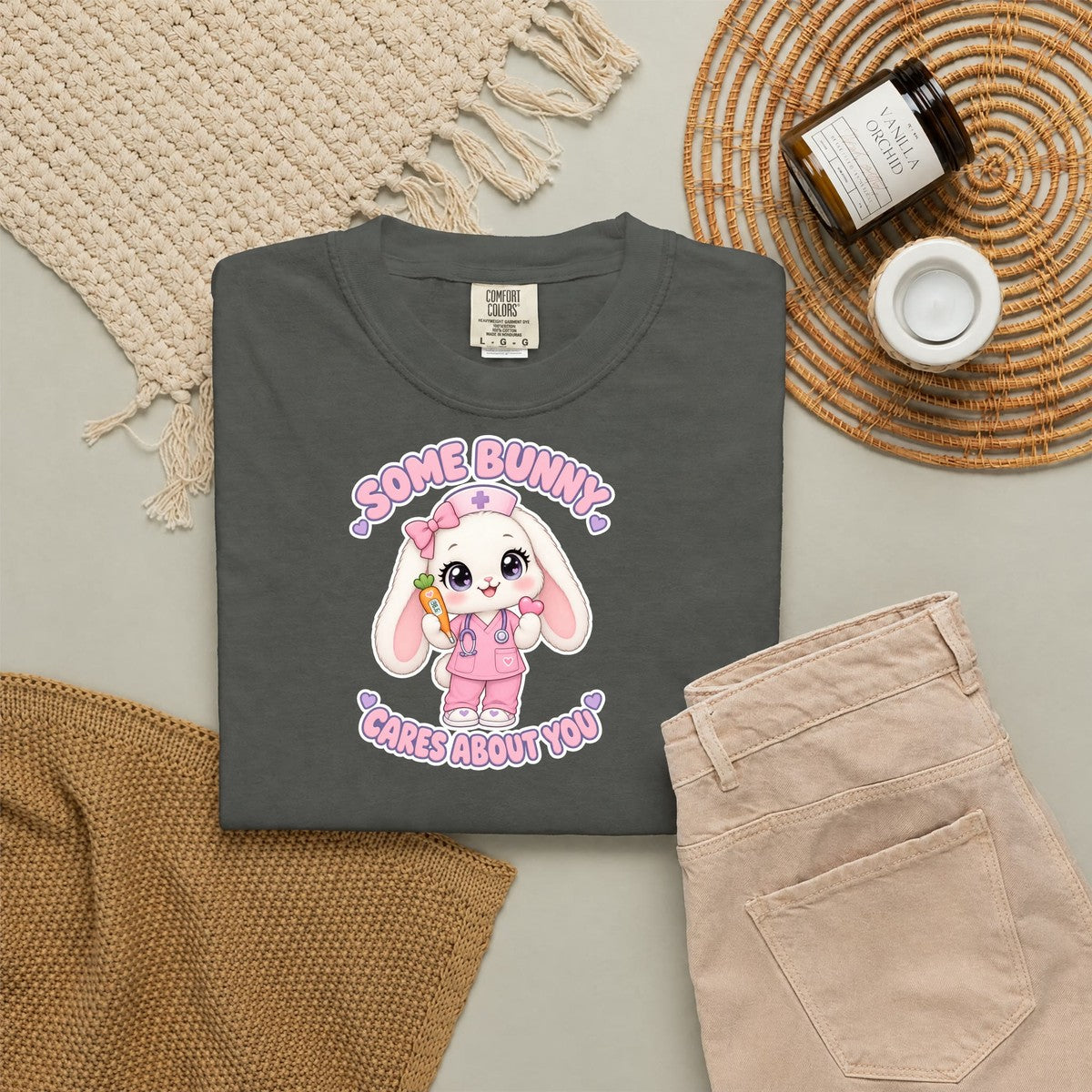 Some Bunny Cares About You Bunny Peds Nurse Pink Comfort Colors T-Shirt folded