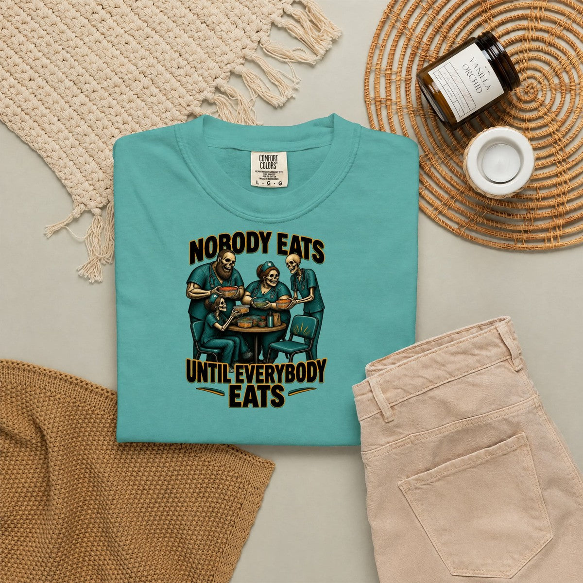 Nobody Eats Until Everybody Eats Skeleton Nurse Comfort Colors T-Shirt folded