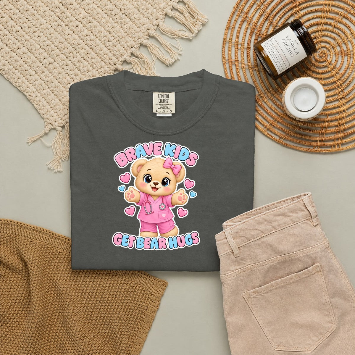 Brave Kids Get Bear Hugs Teddy Bear Peds Nurse Pink Comfort Colors T-Shirt folded